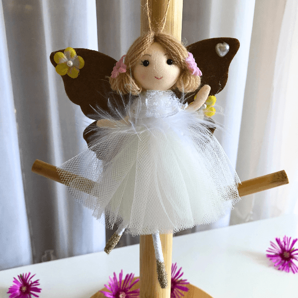 Handmade butterfly and flower dolls