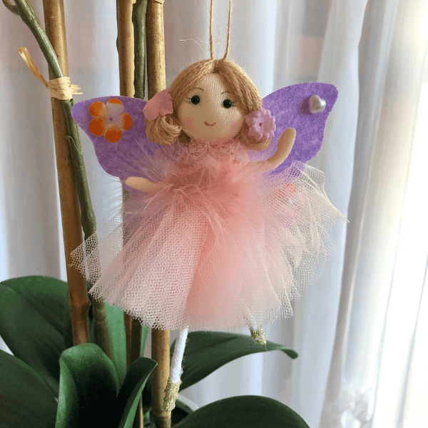 Handmade butterfly and flower dolls