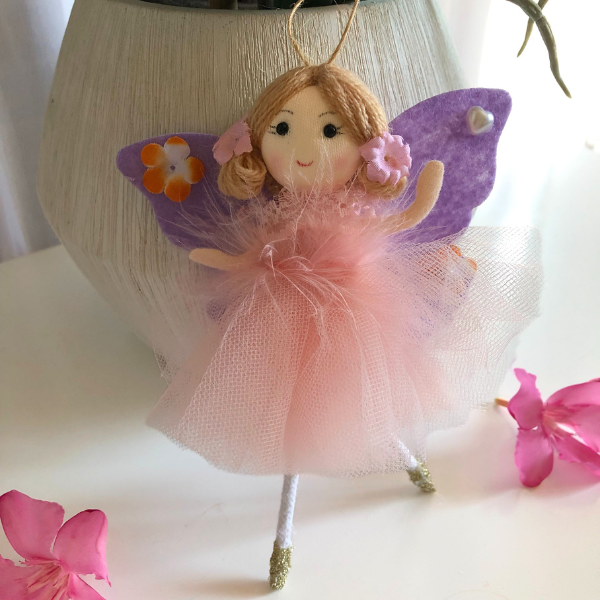 Handmade butterfly and flower dolls