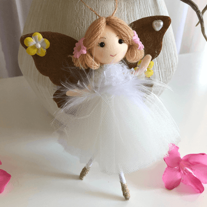 Handmade butterfly and flower dolls