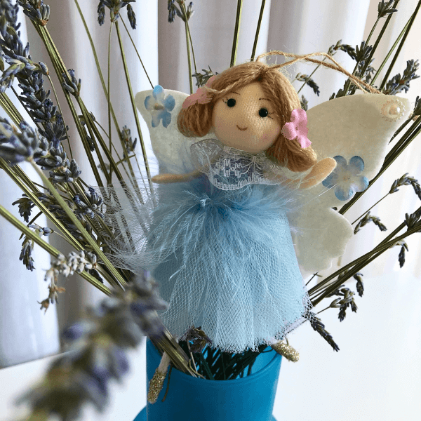 Handmade butterfly and flower dolls
