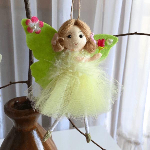 Handmade butterfly and flower dolls