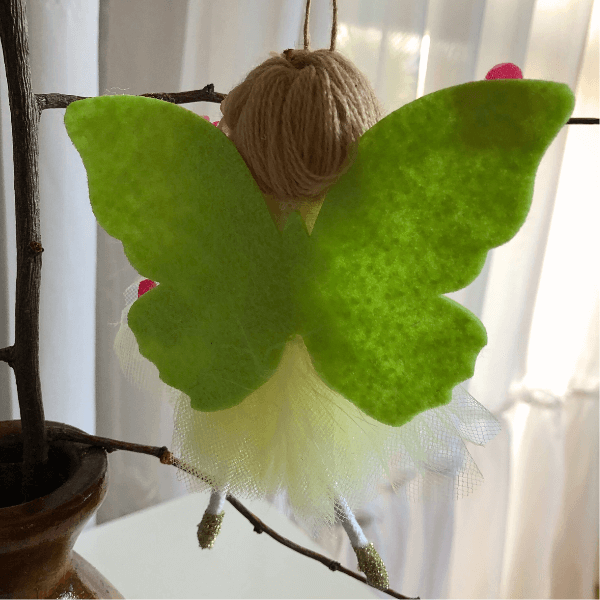 Handmade butterfly and flower dolls