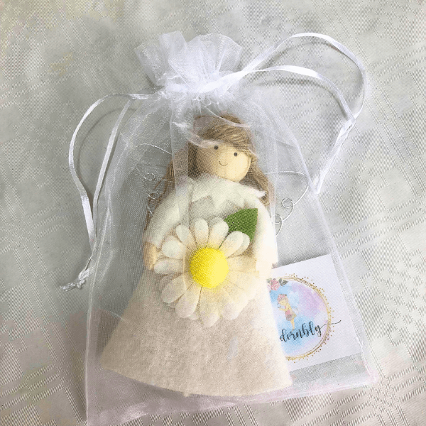 Flower angels - daisy for hope & poinsettia for joy