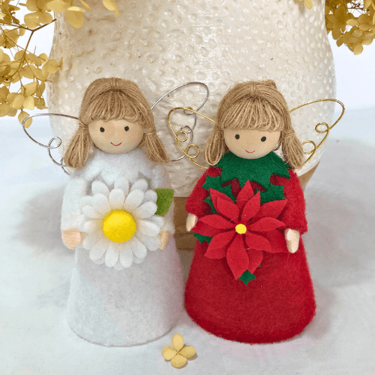 Flower angels - daisy for hope & poinsettia for joy