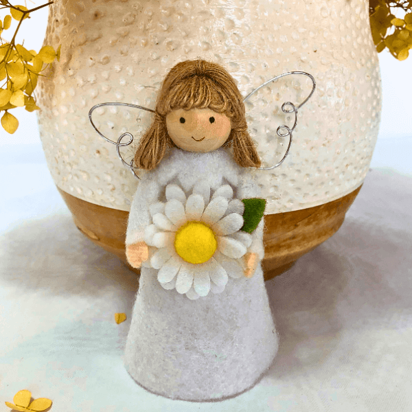 Flower angels - daisy for hope & poinsettia for joy