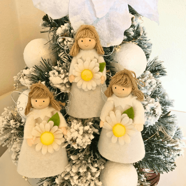 Flower angels - daisy for hope & poinsettia for joy