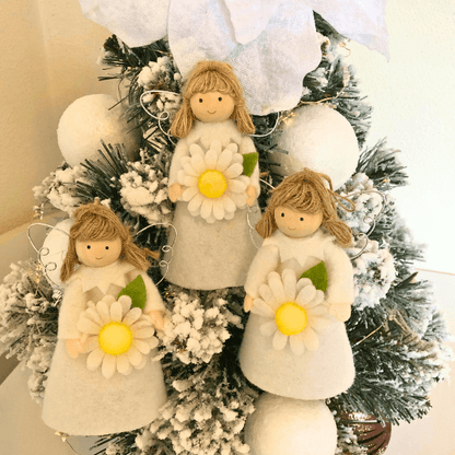 Flower angels - daisy for hope & poinsettia for joy