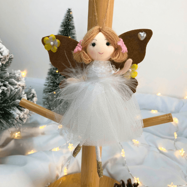 Handmade butterfly and flower dolls