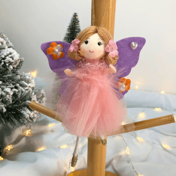 Handmade butterfly and flower dolls